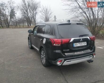 Черный Мицубиси Аутлендер, объемом двигателя 2.4 л и пробегом 81 тыс. км за 20900 $, фото 4 на Automoto.ua
