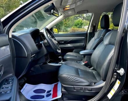 Черный Мицубиси Аутлендер, объемом двигателя 2.4 л и пробегом 46 тыс. км за 3000 $, фото 10 на Automoto.ua