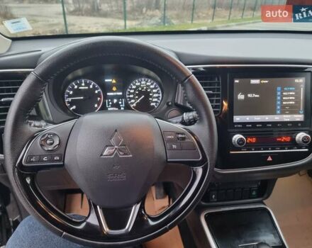 Черный Мицубиси Аутлендер, объемом двигателя 2.36 л и пробегом 127 тыс. км за 20800 $, фото 27 на Automoto.ua