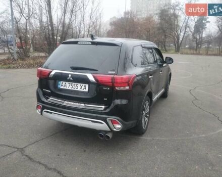 Черный Мицубиси Аутлендер, объемом двигателя 2.4 л и пробегом 81 тыс. км за 20900 $, фото 5 на Automoto.ua