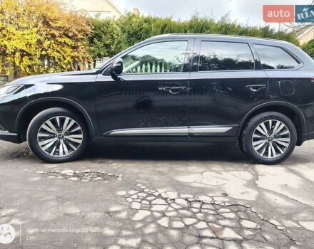 Черный Мицубиси Аутлендер, объемом двигателя 2.36 л и пробегом 50 тыс. км за 21000 $, фото 23 на Automoto.ua