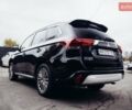 Черный Мицубиси Аутлендер, объемом двигателя 2.36 л и пробегом 110 тыс. км за 28100 $, фото 1 на Automoto.ua