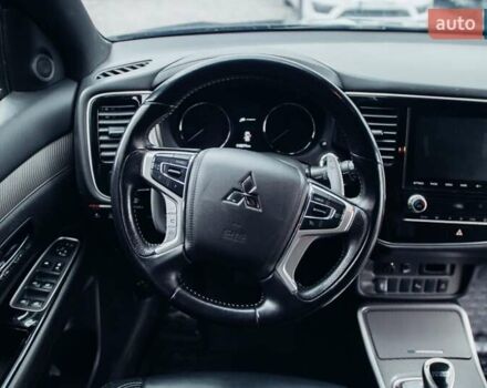 Черный Мицубиси Аутлендер, объемом двигателя 2.36 л и пробегом 110 тыс. км за 28900 $, фото 4 на Automoto.ua