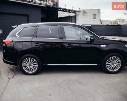 Черный Мицубиси Аутлендер, объемом двигателя 2.36 л и пробегом 110 тыс. км за 28900 $, фото 8 на Automoto.ua