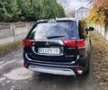 Черный Мицубиси Аутлендер, объемом двигателя 2.36 л и пробегом 50 тыс. км за 21000 $, фото 4 на Automoto.ua