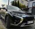 Черный Мицубиси Аутлендер, объемом двигателя 2.36 л и пробегом 31 тыс. км за 26600 $, фото 1 на Automoto.ua
