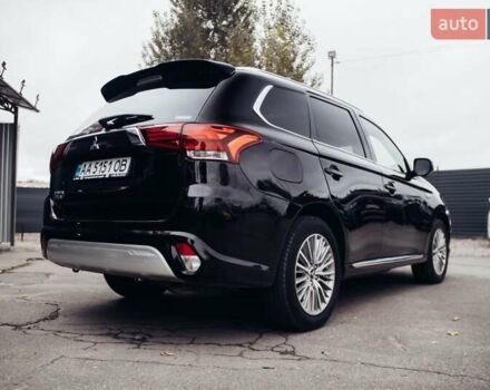 Черный Мицубиси Аутлендер, объемом двигателя 2.36 л и пробегом 110 тыс. км за 28900 $, фото 5 на Automoto.ua