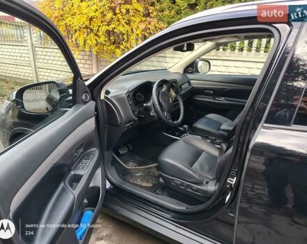 Черный Мицубиси Аутлендер, объемом двигателя 2.36 л и пробегом 50 тыс. км за 21000 $, фото 9 на Automoto.ua