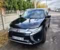 Черный Мицубиси Аутлендер, объемом двигателя 2.36 л и пробегом 50 тыс. км за 21000 $, фото 1 на Automoto.ua