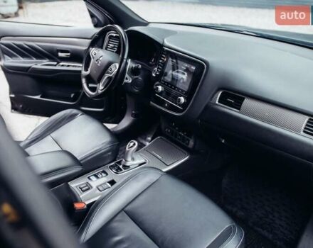 Черный Мицубиси Аутлендер, объемом двигателя 2.36 л и пробегом 110 тыс. км за 28900 $, фото 11 на Automoto.ua