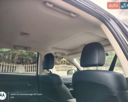 Черный Мицубиси Аутлендер, объемом двигателя 2.36 л и пробегом 50 тыс. км за 21000 $, фото 14 на Automoto.ua