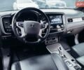 Черный Мицубиси Аутлендер, объемом двигателя 2.36 л и пробегом 110 тыс. км за 28100 $, фото 16 на Automoto.ua