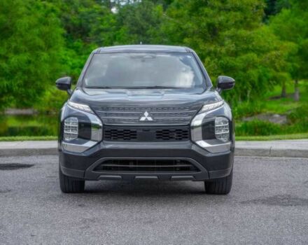 Черный Мицубиси Аутлендер, объемом двигателя 2.5 л и пробегом 10 тыс. км за 8000 $, фото 1 на Automoto.ua