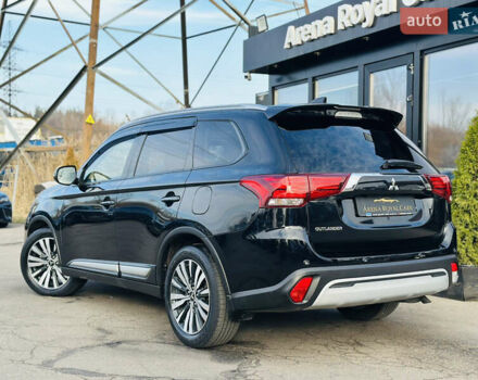 Черный Мицубиси Аутлендер, объемом двигателя 2.36 л и пробегом 64 тыс. км за 29900 $, фото 3 на Automoto.ua