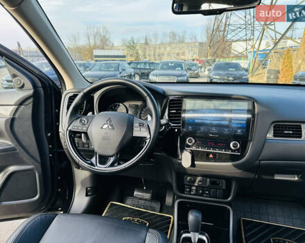 Черный Мицубиси Аутлендер, объемом двигателя 2.36 л и пробегом 64 тыс. км за 29900 $, фото 21 на Automoto.ua