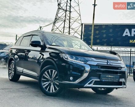 Черный Мицубиси Аутлендер, объемом двигателя 2.36 л и пробегом 64 тыс. км за 29900 $, фото 2 на Automoto.ua