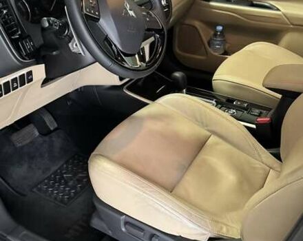 Черный Мицубиси Аутлендер, объемом двигателя 2.36 л и пробегом 60 тыс. км за 25000 $, фото 2 на Automoto.ua