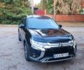 Черный Мицубиси Аутлендер, объемом двигателя 2.36 л и пробегом 63 тыс. км за 30000 $, фото 3 на Automoto.ua
