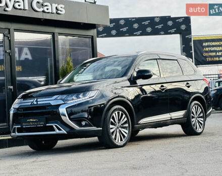 Черный Мицубиси Аутлендер, объемом двигателя 2.36 л и пробегом 64 тыс. км за 29900 $, фото 5 на Automoto.ua