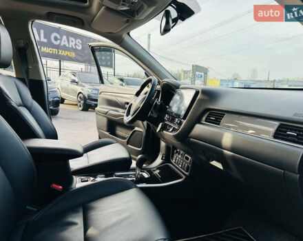 Черный Мицубиси Аутлендер, объемом двигателя 2.36 л и пробегом 64 тыс. км за 29900 $, фото 24 на Automoto.ua