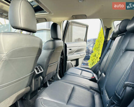 Черный Мицубиси Аутлендер, объемом двигателя 2.36 л и пробегом 64 тыс. км за 29900 $, фото 17 на Automoto.ua