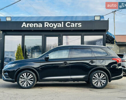 Черный Мицубиси Аутлендер, объемом двигателя 2.36 л и пробегом 64 тыс. км за 29900 $, фото 4 на Automoto.ua