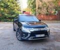 Черный Мицубиси Аутлендер, объемом двигателя 2.36 л и пробегом 63 тыс. км за 30000 $, фото 2 на Automoto.ua