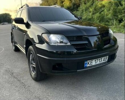 Чорний Міцубісі Аутлендер, об'ємом двигуна 2.38 л та пробігом 212 тис. км за 4800 $, фото 1 на Automoto.ua
