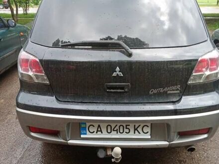 Мицубиси Аутлендер 2003 в Днепре (Днепропетровске) на Automoto.ua Черный Мицубиси Аутлендер, объемом двигателя 2 л и пробегом 320 тыс. км за 6300 $, фото 1 на Automoto.ua