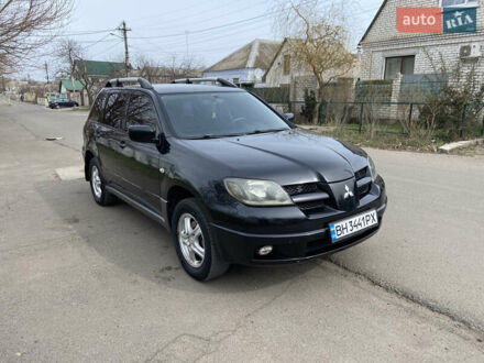 Міцубісі Аутлендер 2003 у Миколаєві на Automoto.ua Чорний Міцубісі Аутлендер, об'ємом двигуна 2.38 л та пробігом 307 тис. км за 5500 $, фото 1 на Automoto.ua