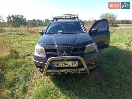 Міцубісі Аутлендер 2003 у Яворове на Automoto.ua Чорний Міцубісі Аутлендер, об'ємом двигуна 2 л та пробігом 360 тис. км за 5400 $, фото 1 на Automoto.ua
