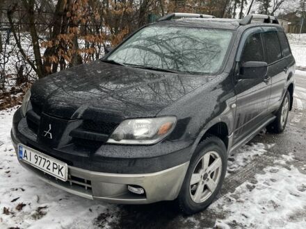 Мицубиси Аутлендер 2003 в Белой Церкве на Automoto.ua Черный Мицубиси Аутлендер, объемом двигателя 2.4 л и пробегом 275 тыс. км за 5200 $, фото 1 на Automoto.ua
