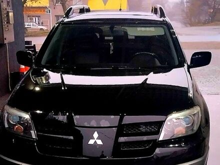 Мицубиси Аутлендер 2003 в Первомайск на Automoto.ua Черный Мицубиси Аутлендер, объемом двигателя 2 л и пробегом 372 тыс. км за 6300 $, фото 1 на Automoto.ua