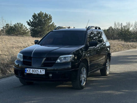Мицубиси Аутлендер 2004 в Днепре (Днепропетровске) на Automoto.ua Черный Мицубиси Аутлендер, объемом двигателя 2.4 л и пробегом 240 тыс. км за 6500 $, фото 1 на Automoto.ua