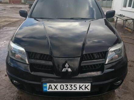 Чорний Міцубісі Аутлендер, об'ємом двигуна 2.4 л та пробігом 3 тис. км за 5500 $, фото 1 на Automoto.ua