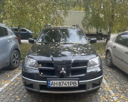 Чорний Міцубісі Аутлендер, об'ємом двигуна 2 л та пробігом 280 тис. км за 5701 $, фото 1 на Automoto.ua