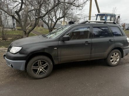 Черный Мицубиси Аутлендер, объемом двигателя 2.4 л и пробегом 3 тыс. км за 5208 $, фото 1 на Automoto.ua