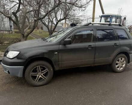 Черный Мицубиси Аутлендер, объемом двигателя 2.4 л и пробегом 3 тыс. км за 5208 $, фото 1 на Automoto.ua