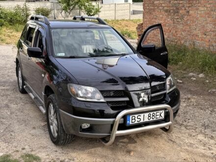 Міцубісі Аутлендер 2004 у Миколаєві на Automoto.ua Чорний Міцубісі Аутлендер, об'ємом двигуна 2 л та пробігом 251 тис. км за 4000 $, фото 1 на Automoto.ua
