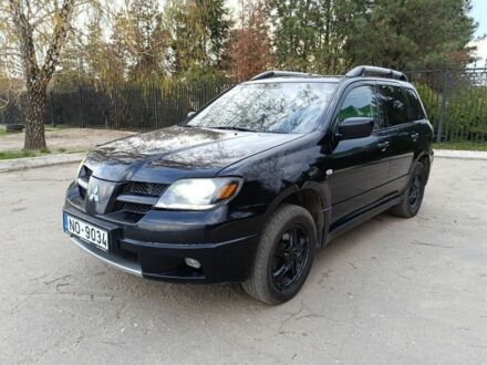 Мицубиси Аутлендер 2004 в Изюме на Automoto.ua Черный Мицубиси Аутлендер, объемом двигателя 2.4 л и пробегом 333 тыс. км за 3500 $, фото 1 на Automoto.ua