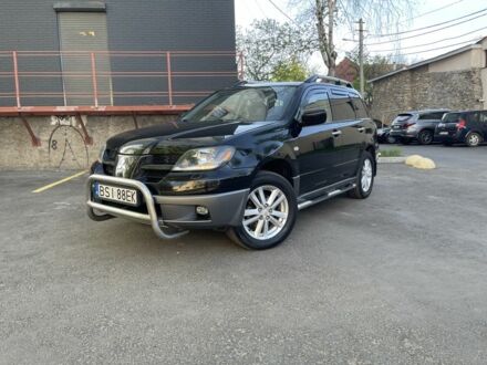 Міцубісі Аутлендер 2004 у Миколаєві на Automoto.ua Чорний Міцубісі Аутлендер, об'ємом двигуна 2 л та пробігом 250 тис. км за 3599 $, фото 1 на Automoto.ua