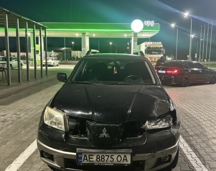 Чорний Міцубісі Аутлендер, об'ємом двигуна 2 л та пробігом 250 тис. км за 3700 $, фото 1 на Automoto.ua
