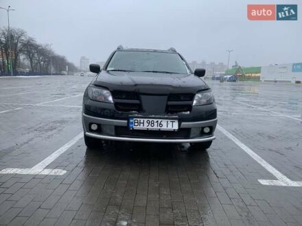 Мицубиси Аутлендер 2004 в Одессе на Automoto.ua Черный Мицубиси Аутлендер, объемом двигателя 2.4 л и пробегом 185 тыс. км за 6500 $, фото 1 на Automoto.ua