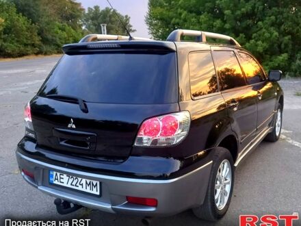 Міцубісі Аутлендер 2005 у Новомосковске на Automoto.ua Чорний Міцубісі Аутлендер, об'ємом двигуна 2 л та пробігом 216 тис. км за 7500 $, фото 1 на Automoto.ua
