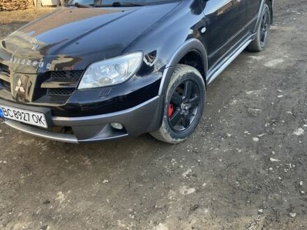 Мицубиси Аутлендер 2005 в Стрые на Automoto.ua Черный Мицубиси Аутлендер, объемом двигателя 2.4 л и пробегом 217 тыс. км за 5500 $, фото 1 на Automoto.ua