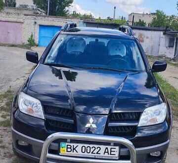 Мицубиси Аутлендер 2005 в Вараш (Кузнецовск) на Automoto.ua Черный Мицубиси Аутлендер, объемом двигателя 2.38 л и пробегом 148 тыс. км за 7500 $, фото 1 на Automoto.ua