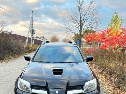 Чорний Міцубісі Аутлендер, об'ємом двигуна 2 л та пробігом 295 тис. км за 7500 $, фото 1 на Automoto.ua