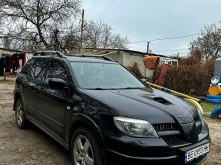 Чорний Міцубісі Аутлендер, об'ємом двигуна 2 л та пробігом 284 тис. км за 7000 $, фото 1 на Automoto.ua