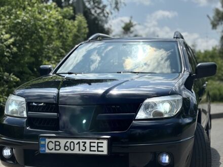 Мицубиси Аутлендер 2005 в Нежине на Automoto.ua Черный Мицубиси Аутлендер, объемом двигателя 2 л и пробегом 285 тыс. км за 7000 $, фото 1 на Automoto.ua