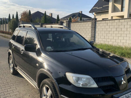 Міцубісі Аутлендер 2005 у Рівному на Automoto.ua Чорний Міцубісі Аутлендер, об'ємом двигуна 2.4 л та пробігом 285 тис. км за 4300 $, фото 1 на Automoto.ua
